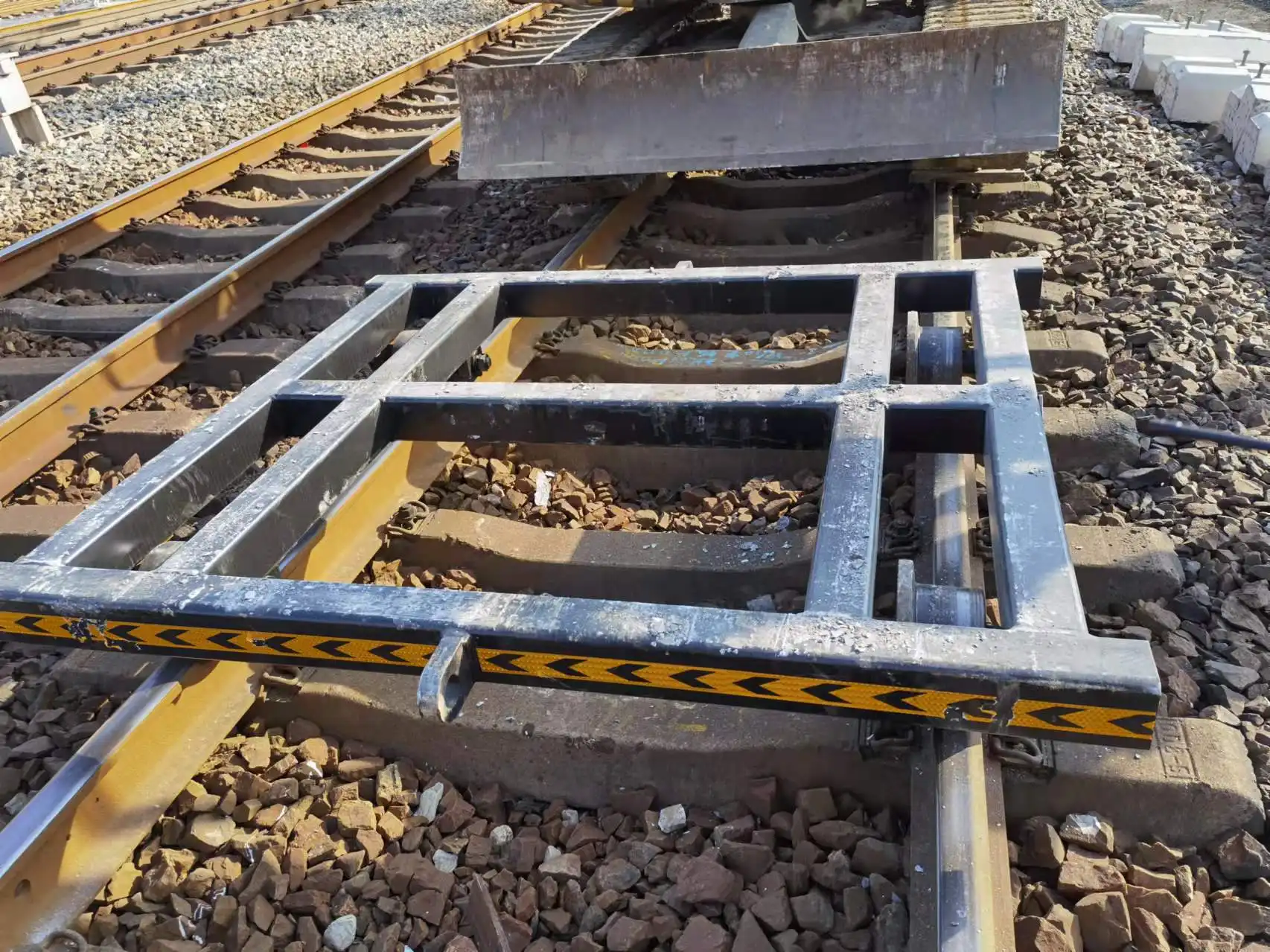 What is the difference between a train and a rail track trolley?